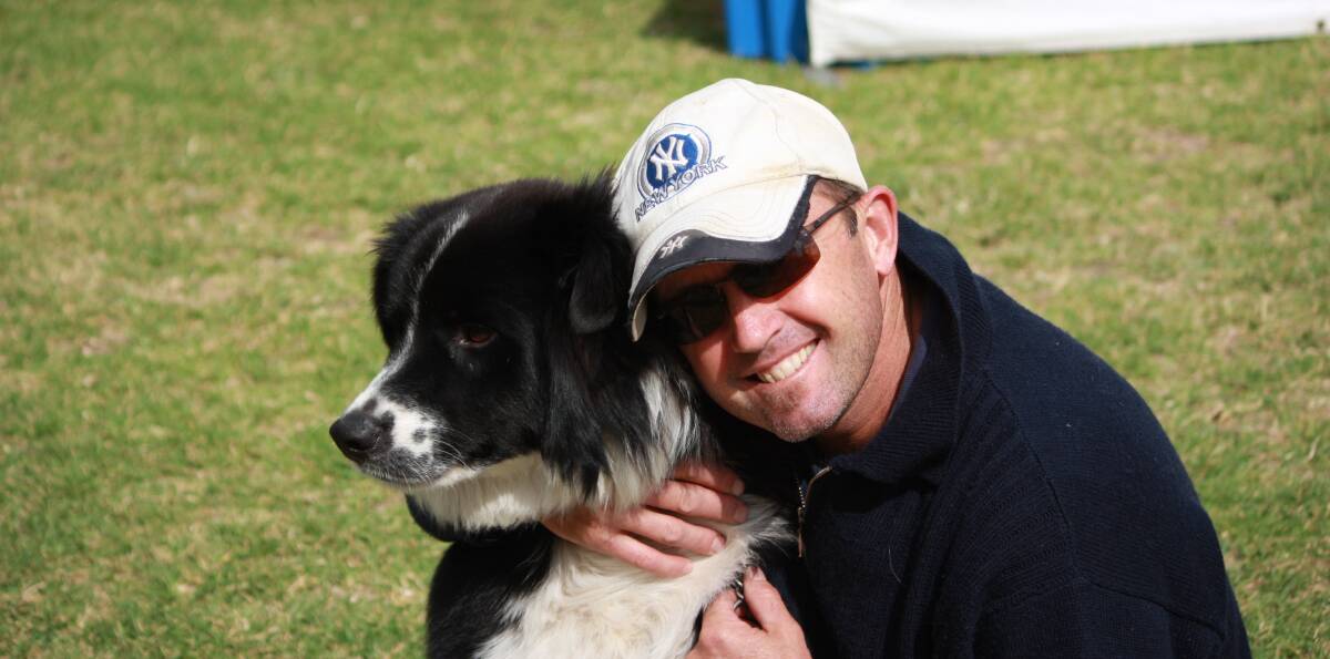 LOVED AND LOST:  Sean Cartledge, pictured here with dog Jack in 2010 during a trip down the Great Ocean Road, was a bright and successful builder and devoted family man who took his life in 2014. Pictures: Supplied