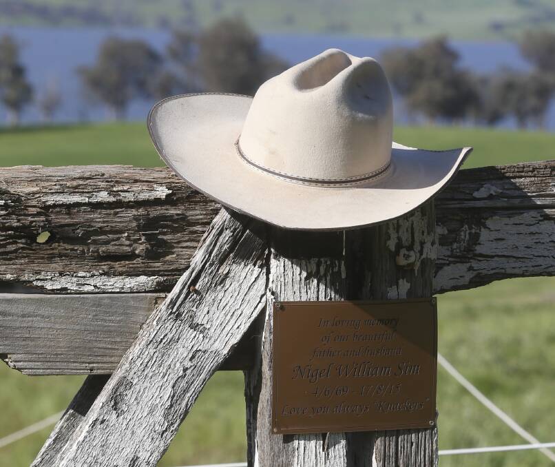 Dad's place: The Sim family created a shrine at their Huon property to honour their beloved father and husband Nigel, who lost his battle with cancer last year.