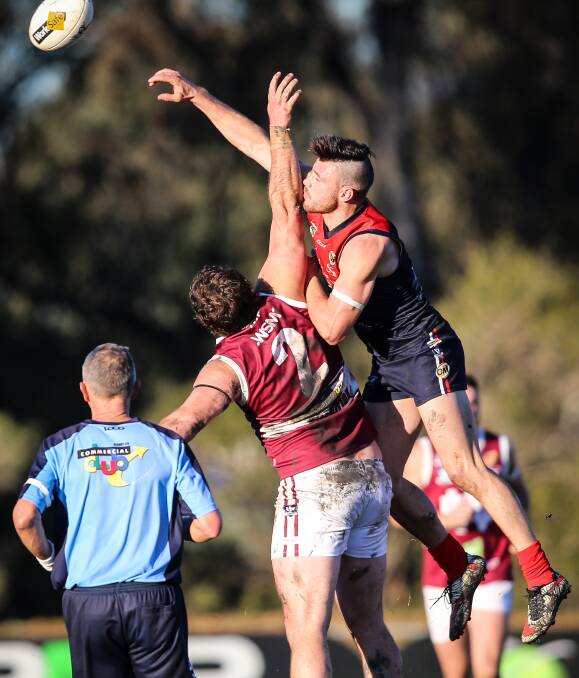 Wodonga's Matt Seiter and Raider Jack Di Mizio do battle in the ruck earlier this season. The Bulldogs were keen to play a stand-alone match against their rivals.
