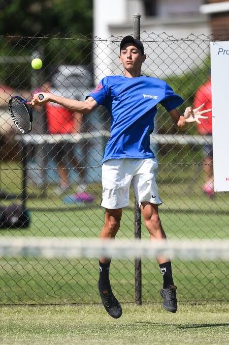 ON THE HOP: McDonald College's Phoenix Baker powers back a forehand at the Albury Grasscourts. Pictures: MARK JESSER