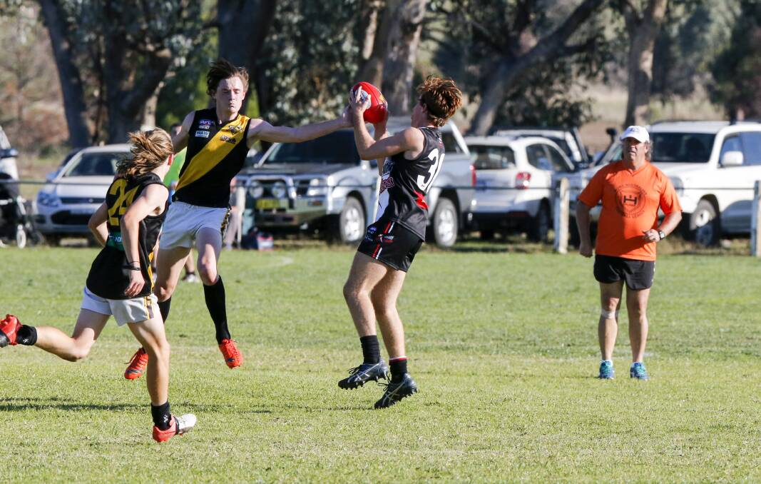 Saint youngster Josh Koschitzke marks at Burrumbuttock. He was among his team's best players.