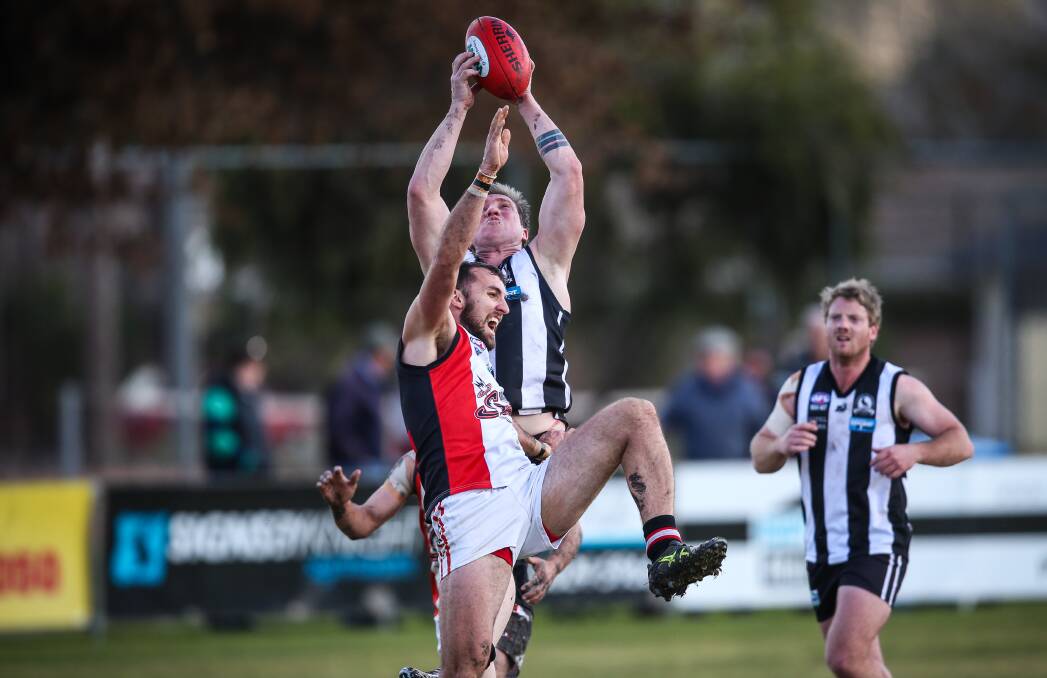 Veteran Magpie Brad Thompson drags down a mark against Brocklesby-Burrumbuttock last month. He looks set to take on DJ Oates in the ruck on Saturday.