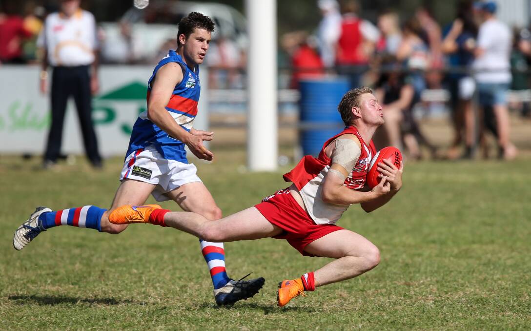 ANOTHER MARK: Key Henty forward Shannon Terlich continued his strong finals form at Walbundrie on Saturday. Picture: JAMES WILTSHIRE