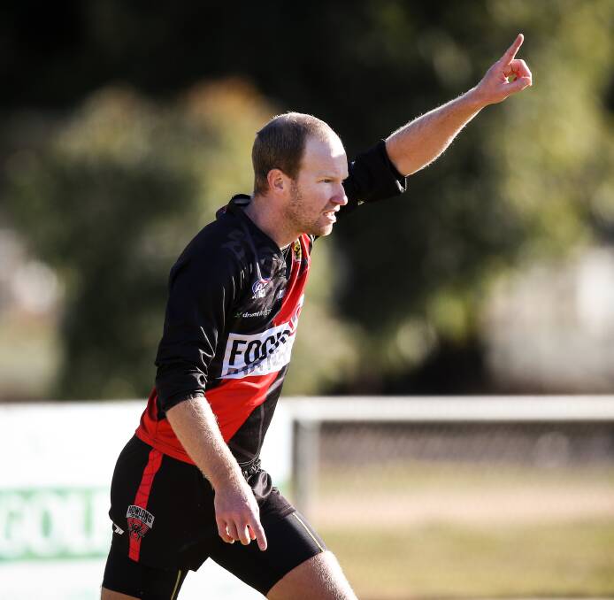 Spider coach Joel Price celebrates one of his six goals against Billabong Crows.