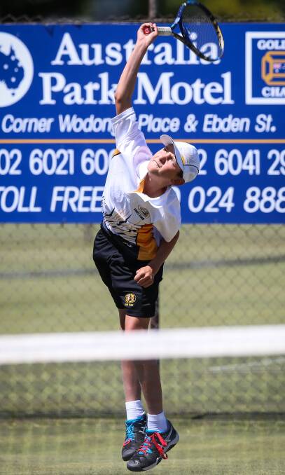 BANG: Western Australian Samuel English cracks down a serve during the Bruce Cup at Albury Grasscourts. Picture: JAMES WILTSHIRE