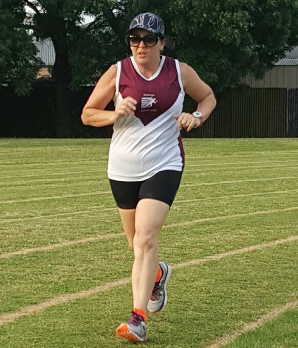 Wodonga's Debbie Jones churns out some laps before Sunday's Gold Coast Marathon. She has improved out of sight since taking up running.