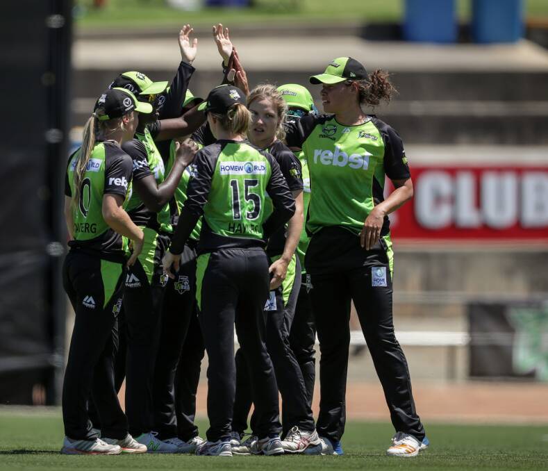 Unbeaten Sydney Thunder celebrate a wicket at Lavington Sportsground on Tuesday. They were never under pressure after being set 8-114 for victory.