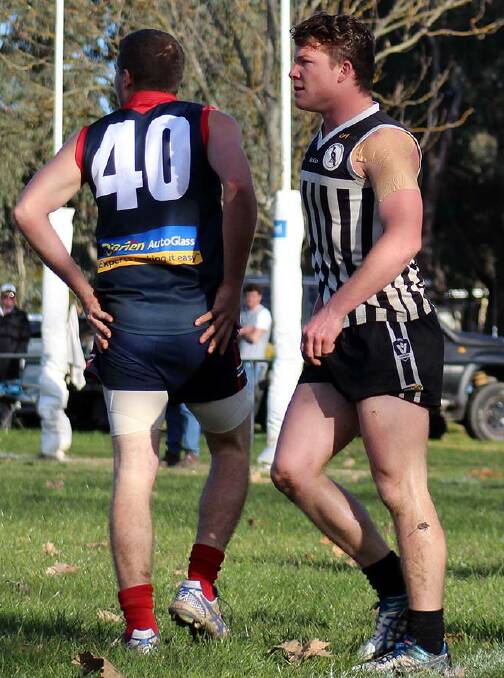 ON BROTHER: Corryong's Jamie McCarthy takes on his brother, Dan, in the Upper Murray league on Saturday. Pictures: DEB HARRAP