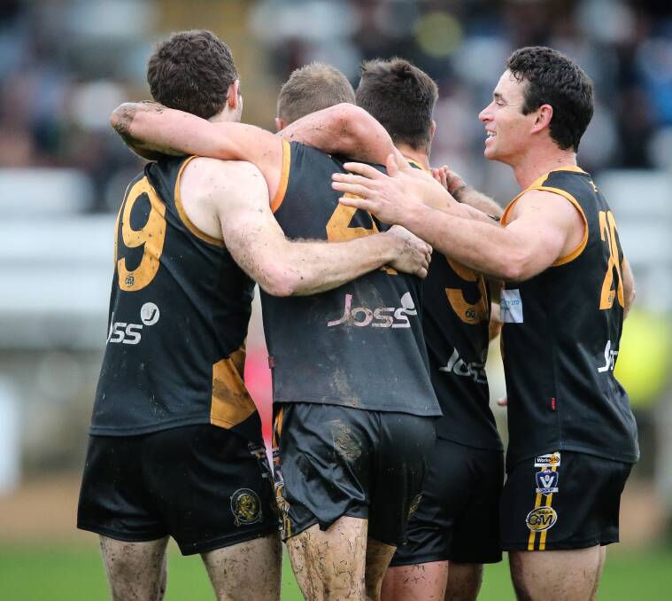 PARTY TIME: Albury's Shaun Daly, Daniel Cross, Brayden O'Hara and Luke Packer celebrate their win after the final siren.