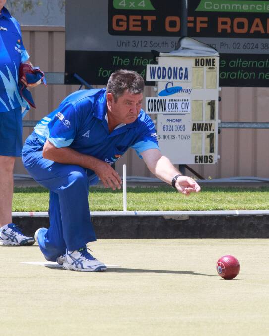 UNDER PRESSURE: Wodonga lead John Howes sends down a bowl in the Bulldogs' loss to Corowa Civic. Pictures: SIMON BAYLISS