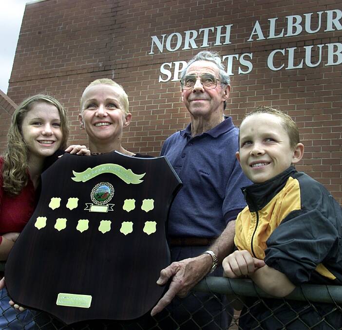 TURNING BACK THE CLOCK: Keith Coleman was instrumental in the introduction of the Stan-Sargeant/Jay McNeil Shield in 2003 when North Albury played Albury. He is pictured with Jay's wife, Chris, and children, Ellen and James.