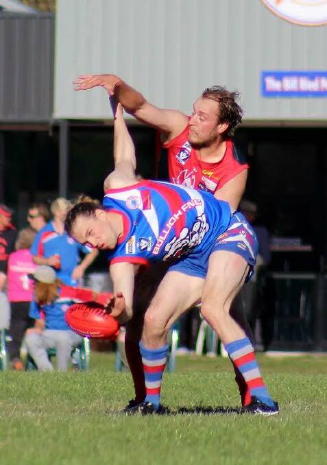 ON A STRING: Bullioh ruckman Max Nicholson takes front position against Corryong's Tom Nicholas in the Upper Murray at Bullioh on Saturday. Picture: DEB HARRAP