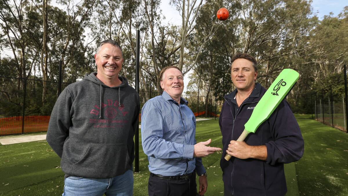 SMASH HIT: Corowa officials Mark Tidd, Shane Norman and Paul Lavis
in the club's new cricket nets. Picture: JAMES WILTSHIRE