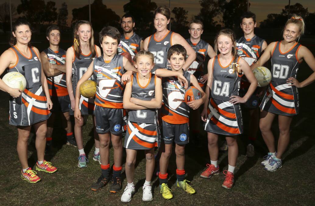 HAPPY CAMPERS: Rand-Walbundrie-Walla's football and netballers have given their new uniforms the thumbs up ahead of Saturday's official unveiling.