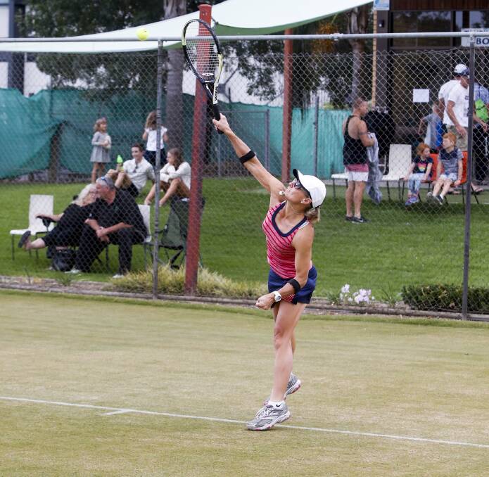 Sally Bulle sends down a serve during her victory on Saturday.