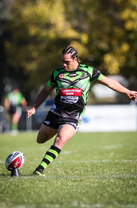 BIG GAME PLAYER: Thunder star Shannon Rupapere takes a kick during his team's thrilling win over Tumut. Pictures: JAMES WILTSHIRE