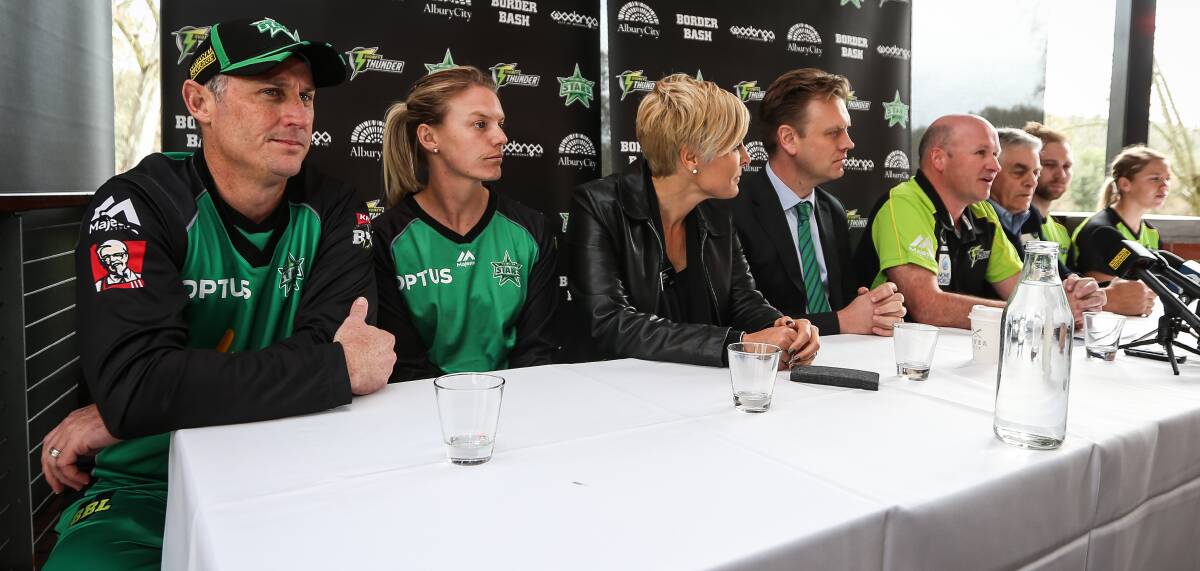 DOWN TO BUSINESS: Melbourne Stars players David Hussey and Kristen Beams (left) at the Border Big Bash launch. Picture: JAMES WILTSHIRE