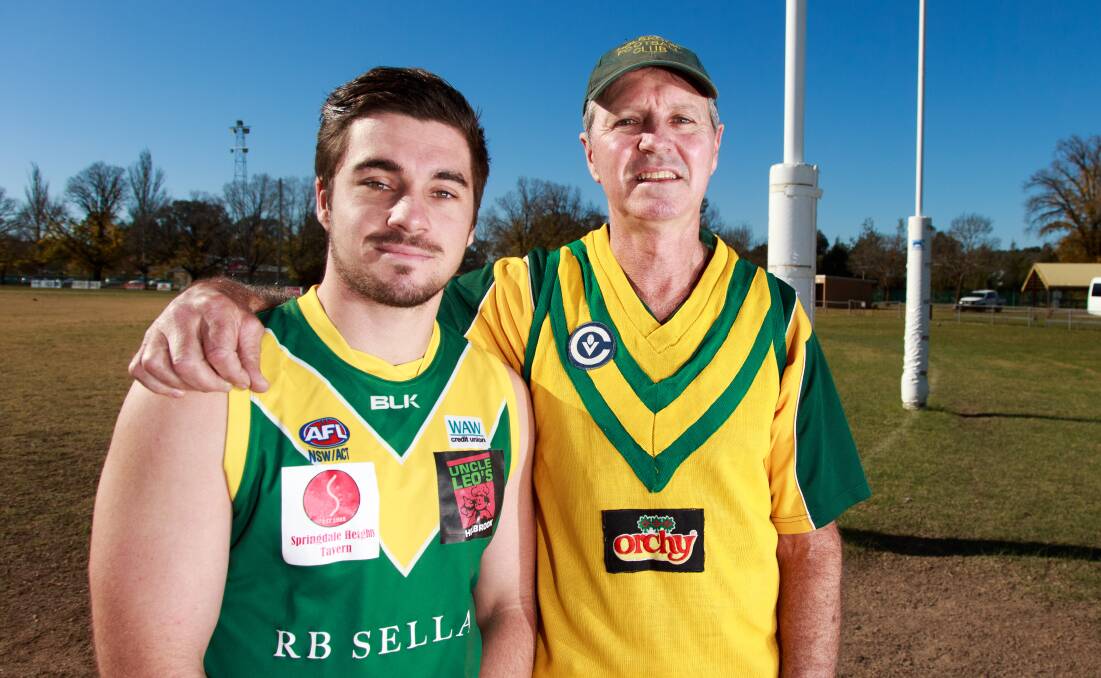 SON OF A GUN: Holbrook skipper Josh Jones with his father, Cameron, ahead of Saturday's big match against Brock-Burrum. Picture: SIMON BAYLISS