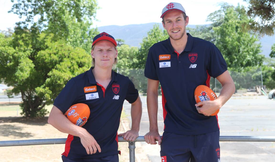 BACK IN TOWN: Former Ovens and Murray players Charlie Spargo and Mitch King visited Corryong with their Melbourne teammates on Thursday . Picture: MARK COLLINS
