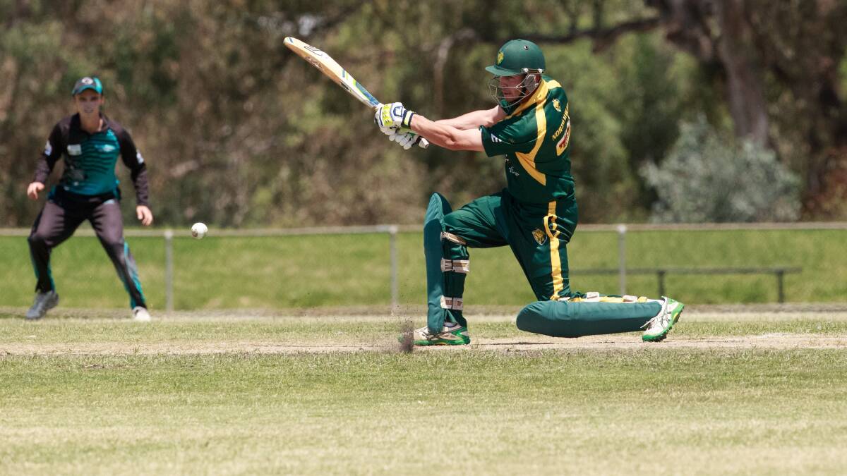 BANG: North Albury opener Ash Borella clubs the ball
to the boundary against Lavington on Saturday.
Picture: SIMON BAYLISS