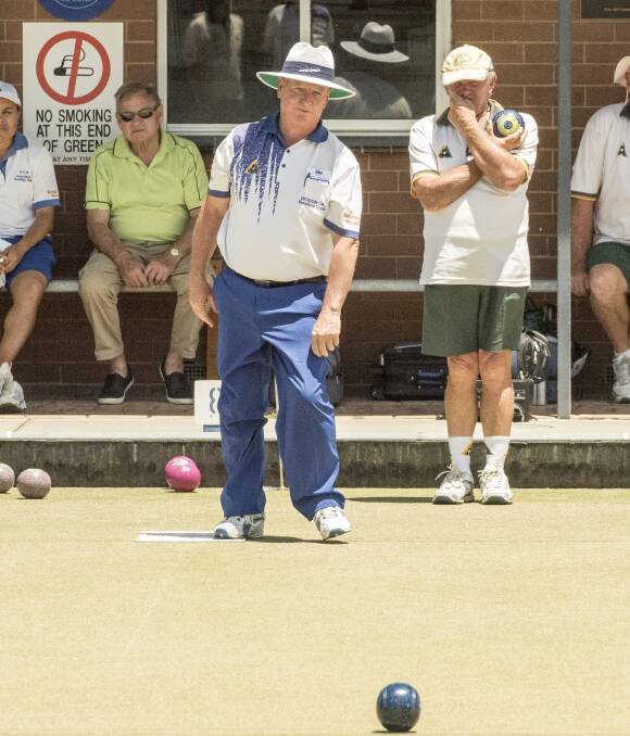 WAIT AND SEE: Wodonga's Rob Taylor sends down a bowl against Yarrawonga at Wodonga on Saturday. The Bulldogs remain undefeated after winning by 11 shots. Picture: SIMON BAYLISS
