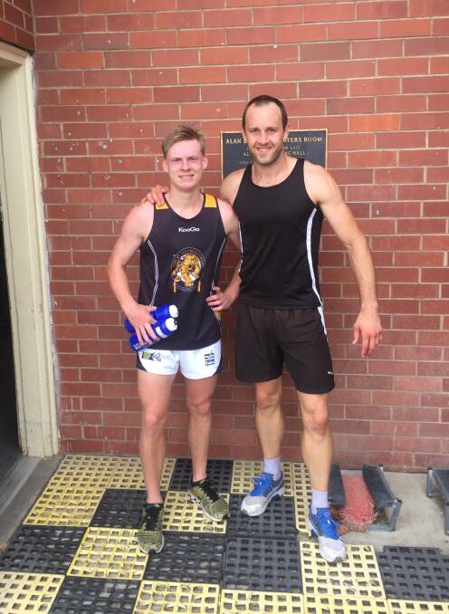 Melbourne draftee Charlie Spargo and Demon runner Daniel Cross at Albury training earlier this year.
