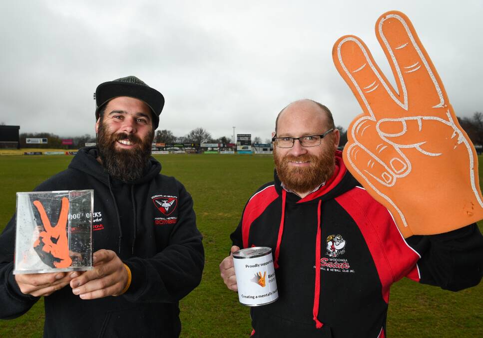 MORE THAN A GAME: Dederang-Mt Beauty's Luke Potter and Wodonga Saints president Dale Skinner will raise funds for the Black Dog Institute.