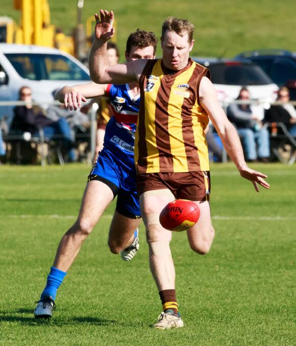 STILL GOING STRONG: Hawk Leigh Cameron drives his side forward against Thurgoona at Sandy Creek on Saturday. Pictures: SIMON BAYLISS