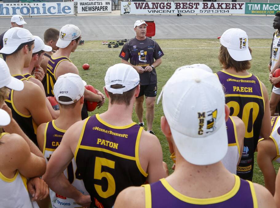 TIME FOR ACTION: Murray Bushrangers coach Leon Higgins talks to his players at Norm Minns Oval this week. Picture: SIMON BAYLISS