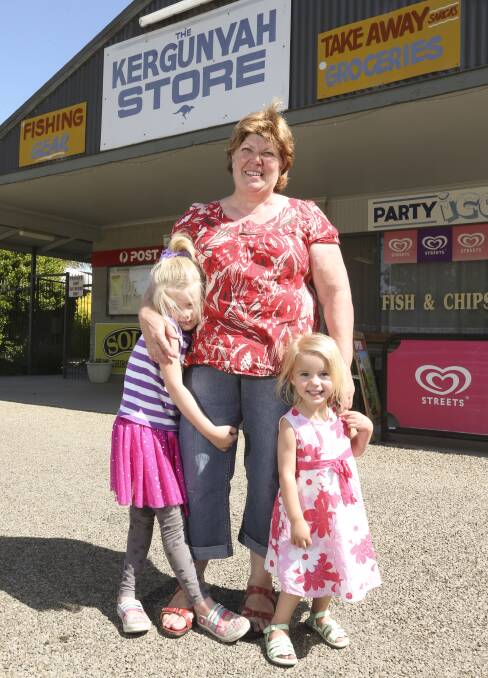 SOLD: Jenny Reynolds with her grand daughters Ella Bartel, 5, and Holly Bartel, 2,  who she hopes to spend more time with after leaving the shop. Picture: ELENOR TEDENBORG