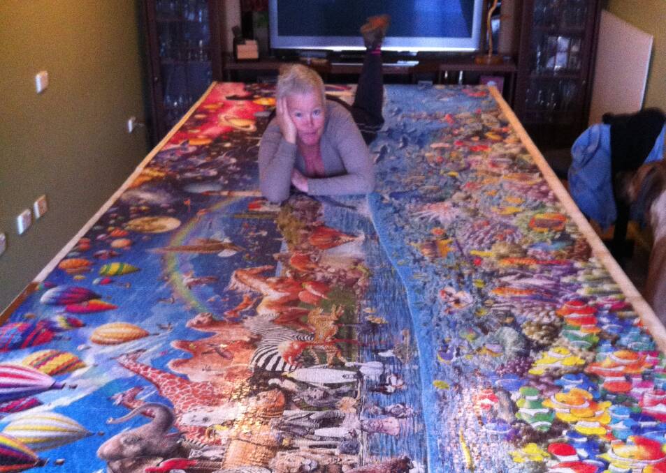 A GOOD FIT: Anne Tempest donated her 24,000 piece puzzle to the Upper Murray Health and Community Services in Corryong. 