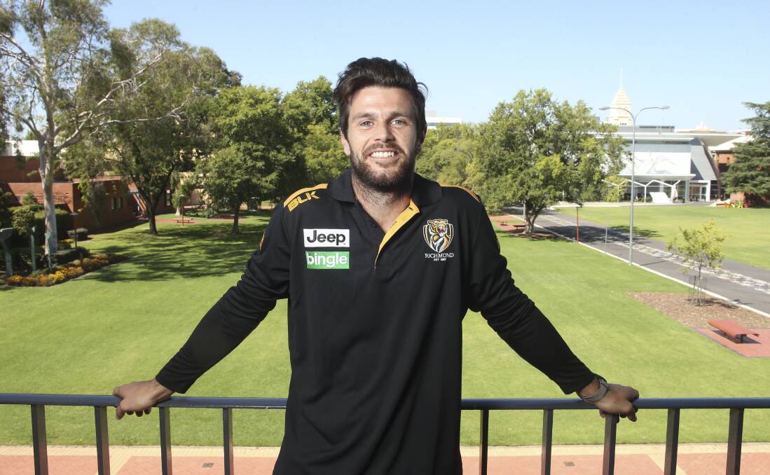 CROWD FAVORITES: Trent Cotchin and Richmond have been given the thumbs up from devoted Collingwood supporter Pete Pattenden for coming to Albury.