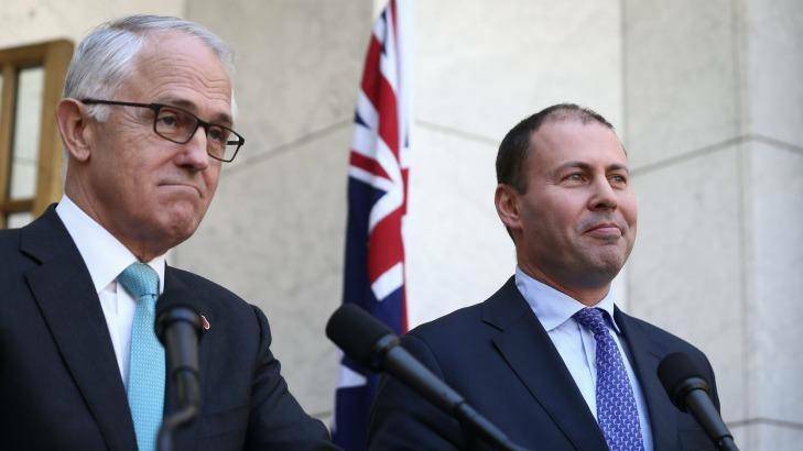 Prime Minister Malcolm Turnbull and Environment Minister Josh Frydenberg announce the climate accord ratification. Photo: Alex Ellinghausen