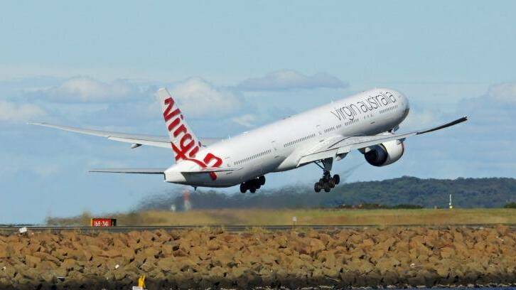 Virgin Australia's losses widened in the first quarter on subdued trading. Photo: Tian Law