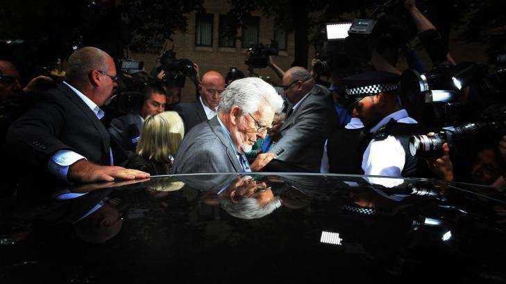 Rolf Harris leaves Southwark Crown Court in London during his 2014 trial. Photo: Paul Hackett
