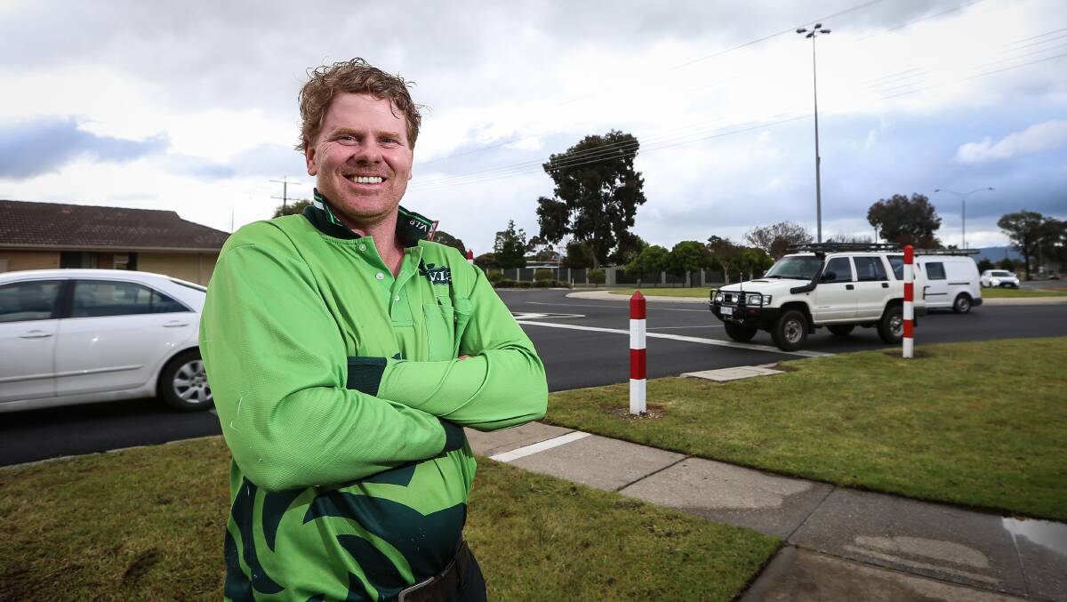 Crossing concern: Wodonga Council candidate Richard Shannon at the roundabout at Melrose Drive and Lawrence Street where school children are endangered, he believes. Picture: JAMES WILTSHIRE