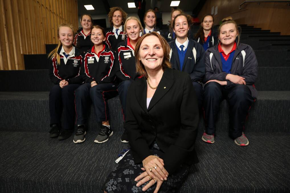 Words of wisdom: Businesswoman Wendy Simpson with some of the year 11 and 12 Victory Lutheran College students who heard her address. Picture: JAMES WILTSHIRE