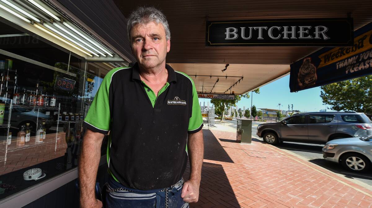 Feeling cut up: High Street butcher Rex McKay is fearful for the future of his business due to looming roadworks in the front of his shop north of the former railway crossing. Picture: MARK JESSER