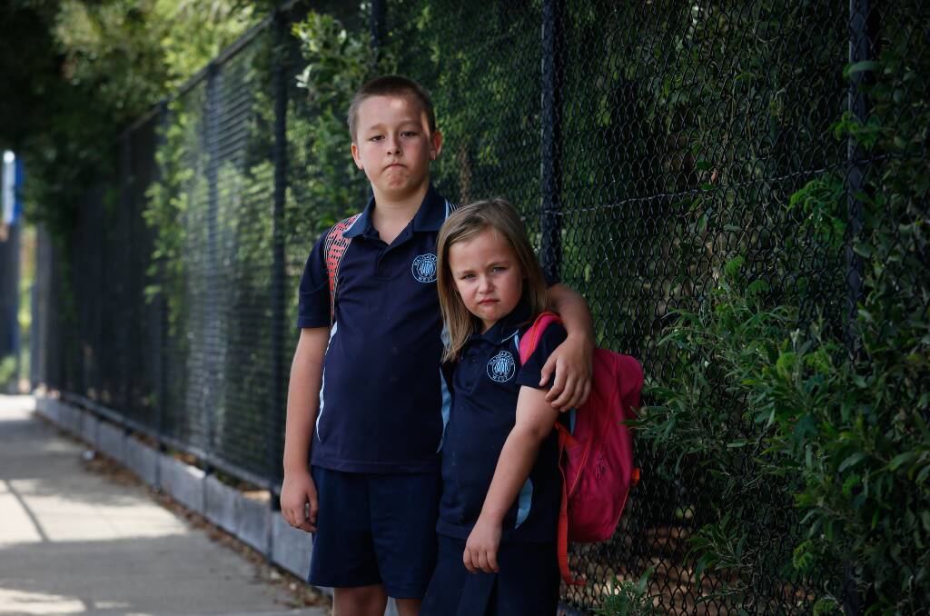 Not happy: Wangaratta West Primary School students Dylan and Bridget Browne were unimpressed at being forced out of classes because of a bomb hoax. Picture: MARK JESSER