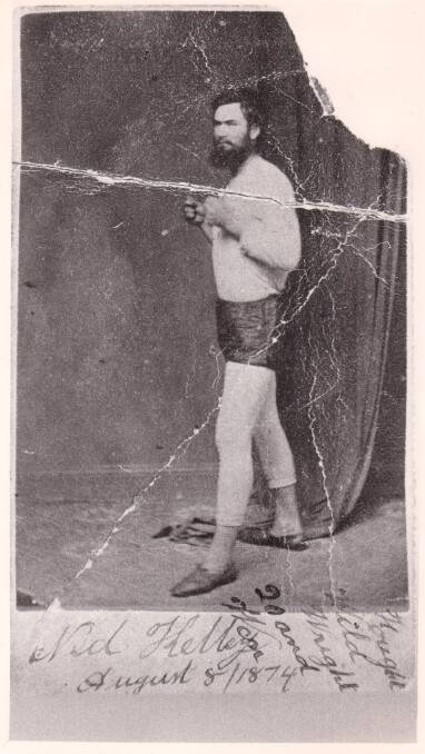 Expensive pose: The 1874 photograph of Ned Kelly which was sold to his family for $55,000 at auction. The image was captured around the period he fought Isaiah “Wild” Wright bare-knuckled over 20 rounds at Beechworth. 