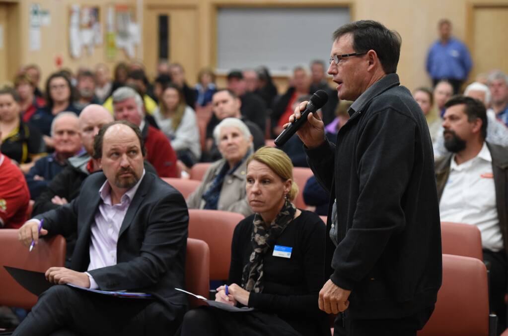 Big not better: Towong Shire mayor David Wortmann airs his belief at Monday night's public meeting that Upper Murray roads will suffer after the dairy closes.