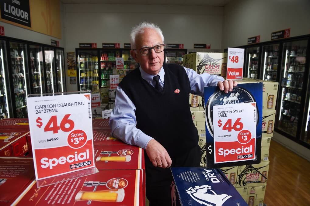 Price pressure: IGA supermarket owner Bob Mathews fears a big drop-off in trade under a container deposit system. Prices are expected to rise from November ahead of its introduction in December.  Picture: MARK JESSER 