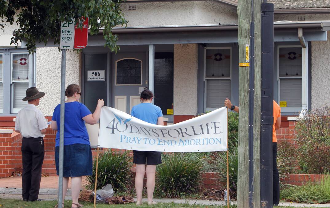 Long running issue: Pro-life campaigners gather outside the Albury abortion clinic in Englehardt Street in 2014 to pray to end pregnancy terminations.