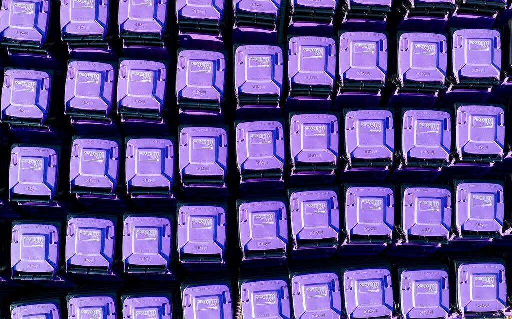 Scores of purple-lidded bins massed before being distributed for use across Goulburn Valley households. Picture from Greater Shepparton Council 