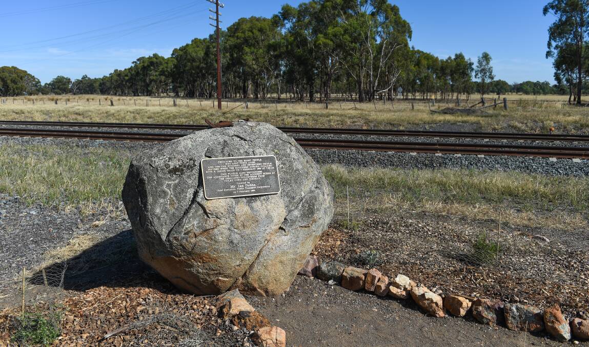 Lone memorial: This plaque on a rock at the site of the crash is the only formal recognition at Violet Town for the collision between trains in 1969.