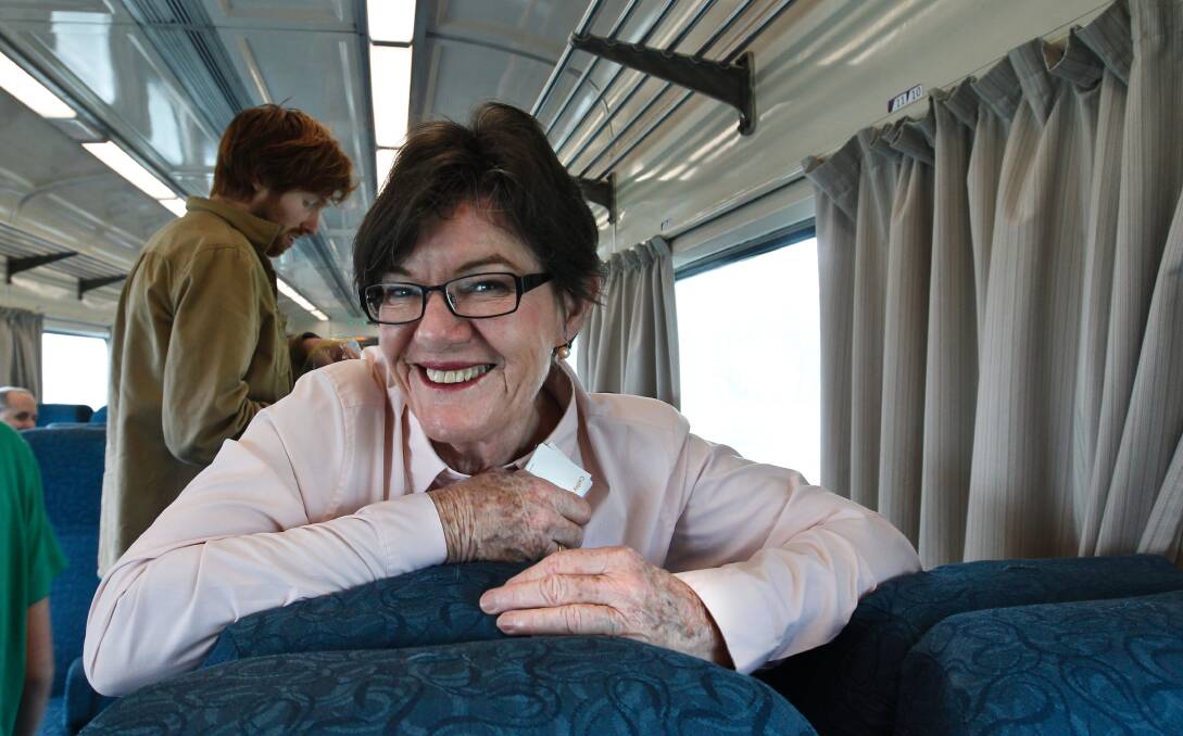 On board: Cathy McGowan during a V/Line train ride taken as part of her 2013 election campaign. The carriage is among those to be refurbished rather than replaced under the Victorian Government's budget plan.