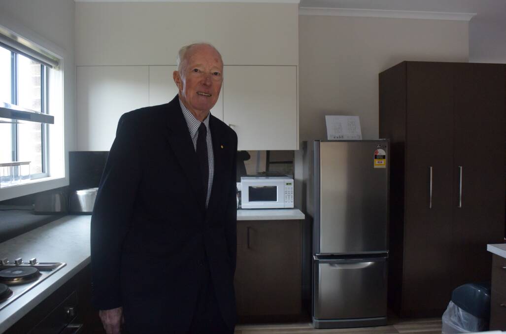 My house: John Richards in the kitchen of the new student accommodation house which has been named after him.