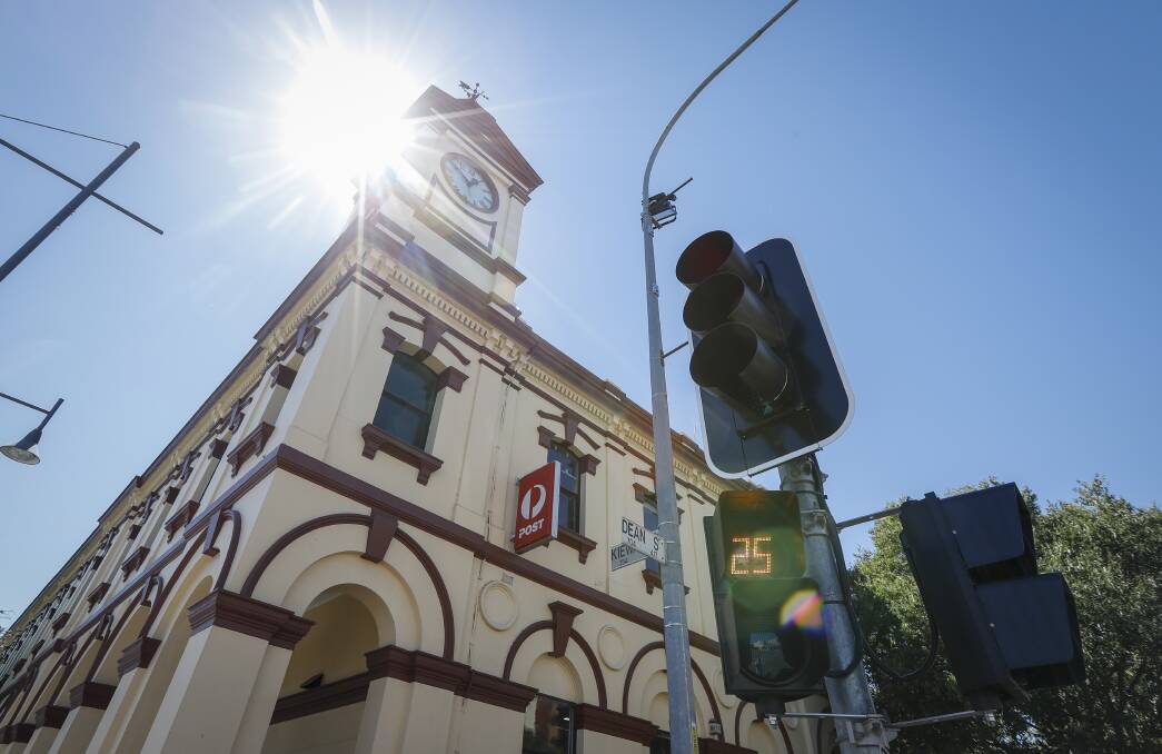Modern touch: The introduction of countdown signs for pedestrians was the most recent addition to Albury's oldest traffic lights. Picture: JAMES WILTSHIRE