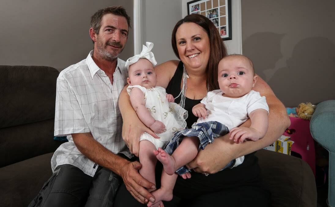 Quite a handful: Scott Ronan and fiancee Nichole Sullivan and their twins Ava and Luke who were born last August. Ava was the equal top girl's name among Border Mail birth notices. Picture: JAMES WILTSHIRE