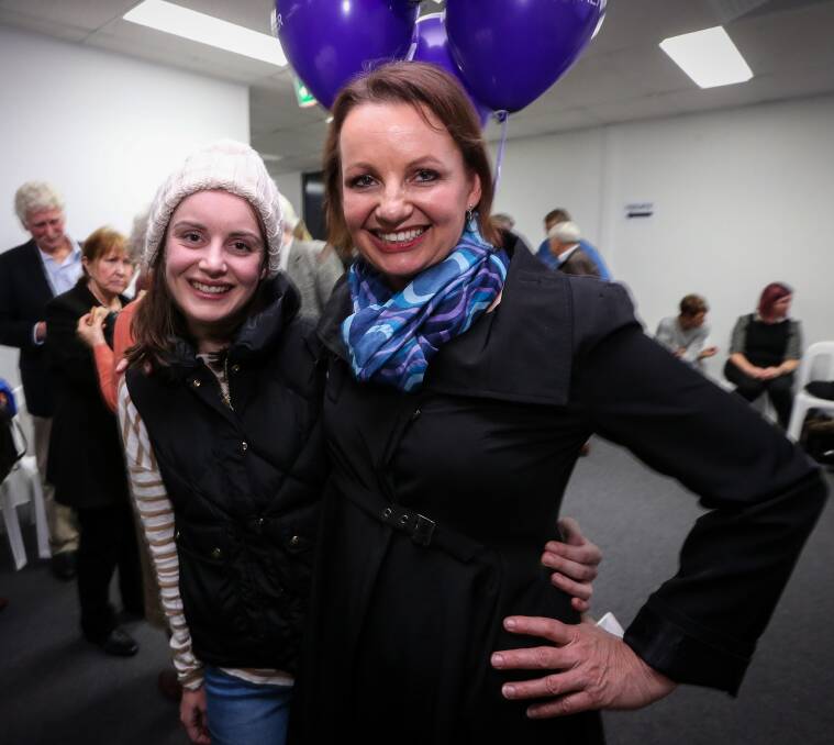 I'm back: Sussan Ley celebrates her success with daughter Georgina. Picture: JAMES WILTSHIRE  